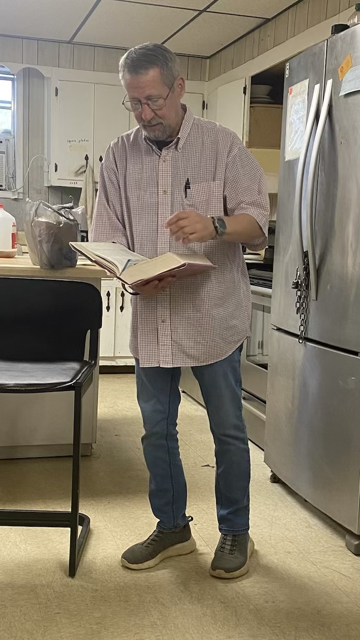 John Means teaching from Scripture at the Bryan Clay House